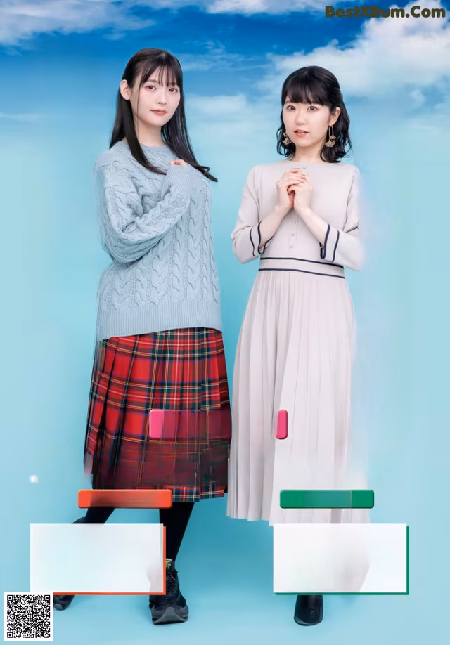 A couple of young women standing next to each other.